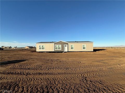 Photo of 12823 Atsina Rd. Rd, Phelan, CA 92371 (MLS # SW25281124)