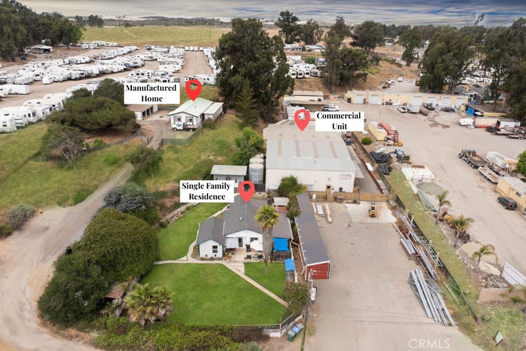 Large industrial building + two single family homes. Positioned on 1.42 acres in a highly accessible Arroyo Grande location, this industrial/mixeduse property presents an exceptional opportunity for investors or owner-users. Just minutes from both Pismo Beach and Nipomo’s commercial
core, the site offers excellent visibility and easy access to areas along the Central Coast. The industrial/commercial portion of the property
encompasses approximately 7,464 square feet of industrial space, currently home to a long-standing, locally operated welding and metal
fabrication business. The seller is open to leasing back the industrial portion, allowing for immediate rental income with a stable commercial
tenant in place. In addition to the industrial component, the property features two income-generating residences. The first is a site-built home
offering a spacious layout with 1 bedroom, 1.5 bathrooms, and 1,482 sqft with potential for two additional rooms with closet additions. A private
fenced yard and detached structure for storage adding flexibility to the space. The second residence is a, 3-bedroom, 2-bathroom, 1,560sqft manufactured home that has been upgraded with new flooring, granite countertops, and vaulted ceilings. A detached four-bay garage and a newer
roof (installed just three years ago) further enhance the property's appeal. With strong rental history, a desirable location, and a unique mix of
commercial and residential components, this property is well-suited for investors seeking steady cash flow or buyers looking for live-work
flexibility. Reach out today to explore the possibilities this dynamic property offers.