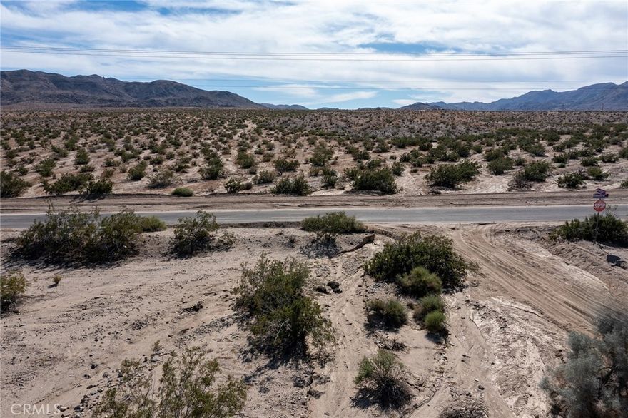 Great opportunity to own a parcel in the Hansen area of Twentynine Palms, offering 360° mountain views, dark night skies, and close access to all the essentials. Convenient location with easy access from Sheridan Ave off Baseline Rd, just minutes from the Joshua Tree National Park eastern entrance and downtown 29 Palms, where new shops, restaurants, and services continue to expand.
Quiet setting with plenty of open space, yet close enough to town for quick access to amenities. Ideal location for those looking to secure land in a growing area of the High Desert. Buyer to verify utilities, zoning, and all intended uses.
Use parcel number on LandGlide for directions - fictitious address