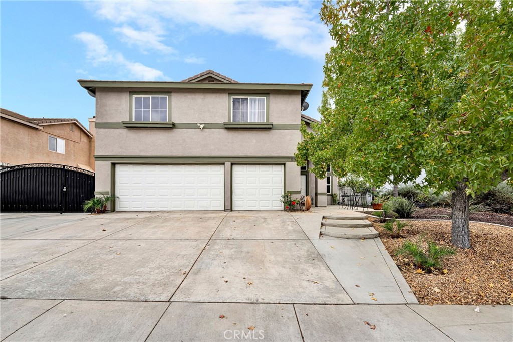 Welcome to 31755 Ridgeview Drive, a spacious two-story home located in the scenic hills of Lake Elsinore. Built in 2001, this well-maintained residence offers approximately 2,655 square feet of living space with a total of 6 bedrooms and three bathrooms. The property features RV parking, a wrought-iron gate for added privacy, and a large patio, complete with patio cover, outdoor fan and electrical outlets - perfect for outdoor entertaining. Inside, the layout provides both formal and casual living areas, ideal for gatherings or quiet evenings at home. Set in a peaceful neighborhood near schools, shopping, and freeway access, this home combines comfort, convenience, and functionality. Whether you’re seeking room to grow or simply enjoy California living with space for your toys, 31755 Ridgeview Drive delivers it all.
