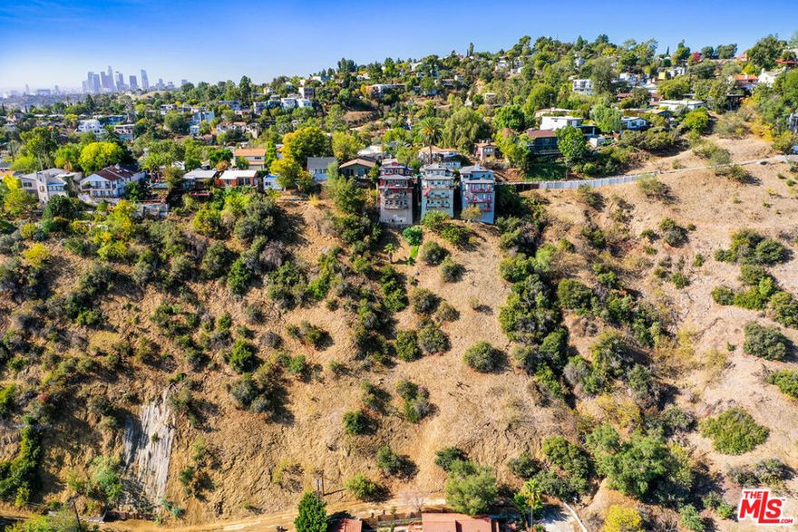 This vacant lot could be the ideal canvas to build the home of your dreams. The hillside parcel is nestled amidst greenery and enjoys majestic views of the San Gabriel Mountains. Surrounded by nature and with great hiking trails nearby, the site is situated for convenient access to urban amenities including grocery stores, restaurants and the Gold Line Metro. The happening Highland Park scene is just a few blocks away with Cookbook Market, Highly Likely, Civil Coffee, HomeState, Kitchen Mouse, a weekly farmers market and so much more.
