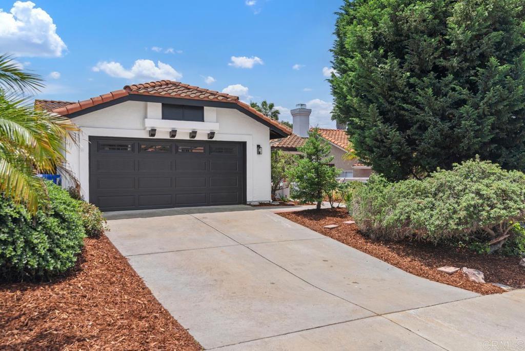 Single story dreaming! Seller will credit buyer 20k in closing costs towards rate buy down with the right offer! Stunning new Carrara marble primary shower! Luxurious single story home with mature native landscaping nestled in the heart of Carlsbad’s highly sought after Summit neighborhood on a cul-de-sac street with no HOA fees. Freshly renovated & offering the perfect blend of modern elegance & laid-back California coastal charm. This home has been meticulously upgraded to provide the ultimate living experience. Upgrades included; Designer interior and exterior paint, new flooring throughout, new exterior lighting, gutters, stunning primary shower, upgraded hall bath, new interior doors, trim & baseboards, upgraded kitchen butcher block countertops & new fridge. Range has gas plumbed in and avl. The floor plan creates a seamless flow between the living, dining, and kitchen areas, while the wood-burning fireplace adds a cozy and welcoming touch as you enter. The expansive master suite is a true sanctuary, offering a generous layout with an en-suite bath, a large walk-in closet, and direct access to the serene private backyard. Whether you're enjoying a quiet morning coffee or unwinding after a long day, this peaceful retreat is the perfect place to relax and recharge. Two additional bedrooms and an upgraded hall bath provide ample space for family, guests, or a home office. The home also features a convenient interior laundry and an attached two-car garage. A short distance to Carlsbad’s pristine beaches, shopping, dining, and top-rated schools, this home offers the best of coastal living. Perfect forever home sweet home!