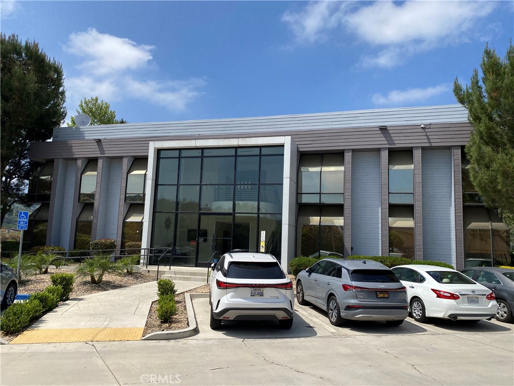 A very unique and elegant atmosphere for a good size company. The unit has three separate offices with latge entry area that could be divided into more office spaces. A guest area close to entry area, and a kitchnette with plenty of starage cabinets. Two large size offices have windows looking out to a calming tree view. plnty of parking spaces for clients, very close to 57 and 60 Frwy. Must see to appreciate ,,,