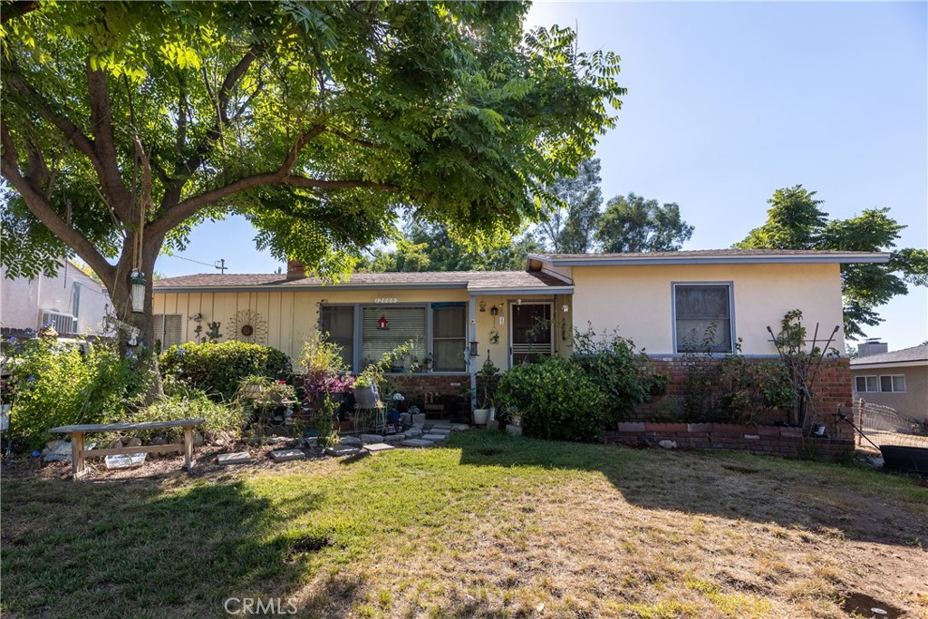 Opportunity knocks in South Redlands! This 2-bedroom, 1-bath home with a converted garage bonus room with an additional half bath is ready for a buyer with vision. Tucked on a spacious lot, 12788 17th St offers a rare chance to own in a desirable area at an affordable price. The home features a cozy living room with a fireplace, an inside laundry room, and a large fenced backyard with room to expand or create your dream outdoor space. The converted garage offers flexibility as a third bedroom, office, or guest space. Conveniently located with quick access to the 10 Freeway, this home is ideal for commuters or investors. Currently tenant-occupied and in need of some TLC, this fixer-upper is perfect for investors, flippers, or anyone looking to build equity in a prime Redlands location. Don’t miss this diamond in the rough—opportunities like this are hard to find!