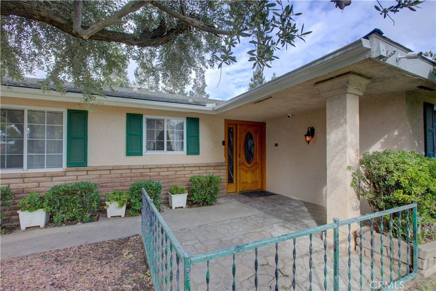 This 4-bedroom, 2-bath home offers 2,473 sq. ft. of living space on a 13,416 sq. ft. lot and is ready for your personal touch. Built in 1974, it features a formal living room and a spacious family room with a brick fireplace and built-in bookcases. The kitchen includes tile counters and floors, a built-in oven, electric cooktop, microwave, dishwasher, disposal, and a breakfast nook with a wet bar. The enclosed patio with ceiling fans opens to a large backyard with a sparkling pool—perfect for entertaining! The garage has been converted into a generous game room with an indoor spa and laundry area. The primary bedroom includes a walk-in closet, private bath, and access to the backyard. Additional highlights include ceiling fans throughout, plenty of storage, and possible RV parking or space for a tool shed. Don’t miss this great value and opportunity to make it your own!