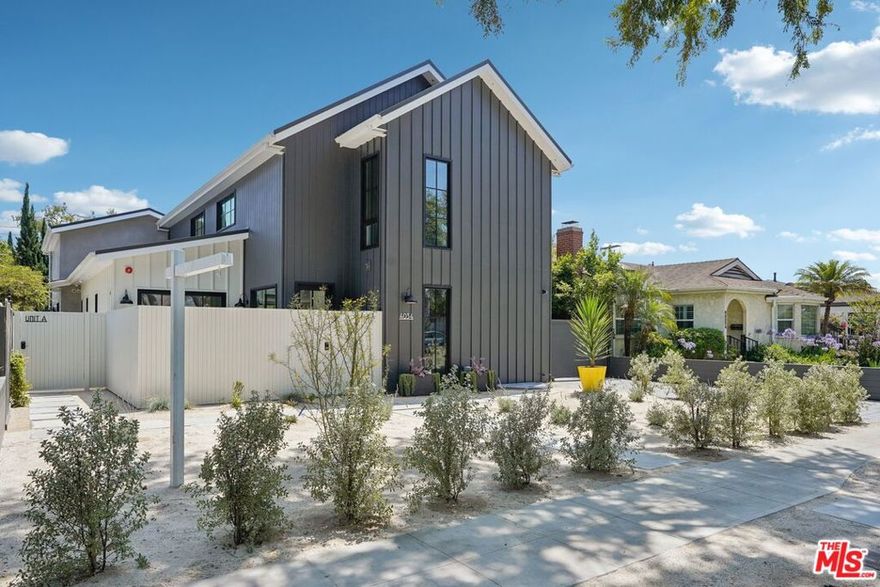 The Coolidge House is a newly built modern farmhouse that blends timeless design with forward-thinking healthy home features, setting a new standard for Culver City living. Completed in 2025 by renowned local builder Dilworth Homescelebrated for their craftsmanship, quality, and use of premium materialsthis one-of-a-kind residence raises the bar for construction with high-performance systems rarely seen in the market.Tucked along a picturesque, Chinese Elm tree-lined street on the westside of Culver City, the home spans approximately 4,155 square feet and immediately welcomes you with warmth and light. Expansive windows and skylights flood the open-concept layout with sunshine, while natural textures, plastered walls, and clean lines create an effortless balance of comfort and modern style. With four spacious bedrooms and four designer bathrooms, the interiors are crafted for both everyday living and elegant entertaining, seamlessly connecting indoor and outdoor spaces.At the heart of the home is a true chef's kitchena space that's as functional as it is beautiful. Outfitted with professional-grade appliances, it features an all-electric induction cooktop, dual dishwashers (full-size and drawer), dual sinks, and a custom built-in Thermador refrigerator and freezer. Thoughtful design makes cooking and entertaining effortless while supporting a clean, high-performance environment.The lower level reveals a rare find: a seismically engineered entertainment basement with soaring 10-foot ceilings. Complete with a stylish wet bar, mini fridge, full bathroom, and server-ready utility room, it's also prewired for a home theater. Thanks to natural light from an egress window, this versatile space easily transforms into a screening room, gym, studio, or private retreat.This home is as healthy as it is beautiful. Dual Energy Recovery Ventilation (ERV) systems deliver filtered fresh air 24/7, while a five-zone Mitsubishi HVAC ensures personalized comfort. Sustainable, resilient features include ZIP System sheathing for an airtight envelope, Advantech waterproof subfloors for superior sound and moisture protection, Vulcan fire-rated soffit vents, no-VOC glues and adhesives, and Schluter waterproofing systems. The exterior is fortified with James Hardie fiber cement board, stucco, and a standing seam metal roofall fire-resistant materials that complement the home's modern farmhouse aesthetic.Additional innovations include American-made solar panels with micro-inverters and smart home technology such as a Vivint security system with cameras and app-based monitoring.Beyond the main residence sits a private 655-square-foot ADU with soaring 16-foot ceilings, a full kitchen, elegant bath, walk-in closet, and lofted bedroom. With its own side-yard entrance and backyard, the ADU offers ultimate flexibilityperfect for guests, extended family, rental income, or a private workspace.Outside, drought-tolerant landscaping and an automatic drip irrigation system provide year-round beauty with minimal upkeep.And the location? Unmatched. Nestled near the Mar Vista border, you'll enjoy Culver City's top-rated schools and easy access to local favorites like The Culver Steps, Platform LA, Helms Bakery District, and the Arts District. Grab a latte at Blue Bottle, savor dinner at Margot, or spend a sunny afternoon in Carlson Parkall just minutes from your front door.The Coolidge House isn't just a place to liveit's a sanctuary. A home designed to inspire healthier living, joyful gatherings, and everyday comfort. Come see for yourself what makes this residence truly extraordinary.