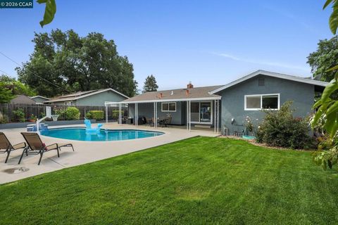 Photo of 5187 Greenmeadow Dr Dr, Concord, CA 94521 (MLS # 41132419)