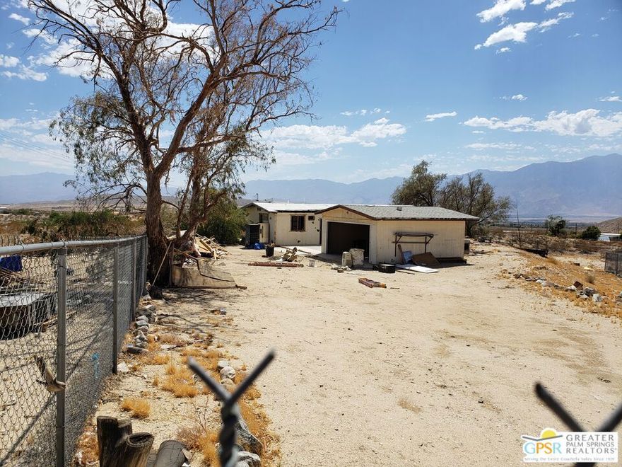Price reduction, motivated seller. Fixer home on 5 acres, horse property, comes with county approved plans. The  permit for rebuilding has expired and a new permit will need to be applied for. Seller has decided not to complete project and moved out of state. Contractor/Electrician has completed many aspects of the project such as wiring and demo since photos were taken. Make it your own forever home or fix and flip. Comes with outbuilding that was being used as guest quarters and 2 car garage. Fenced property with recent septic replacement and 360 degree panoramic views, circle driveway and city water.