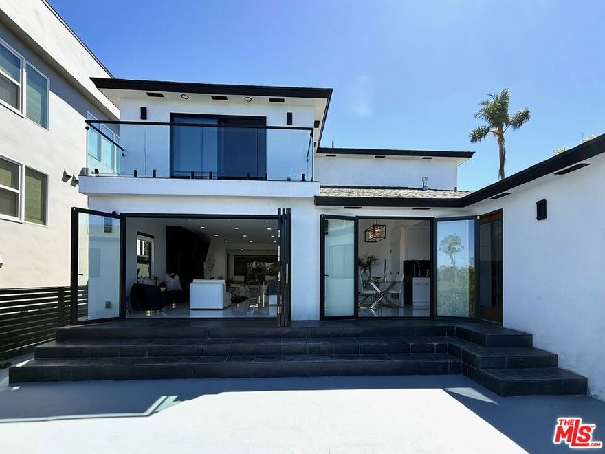 Welcome to this beautifully maintained 3-bedroom, 4-bath residence with an additional versatile den/office in the heart of historic View Park. Situated on a quiet, tree-lined street, this spacious traditional home blends timeless character with thoughtful updates. The light-filled floor plan features a generous living room with fireplace, formal dining area, and an open, beautifully appointed kitchen with high-end appliances. Glass sliding doors in the living room open fully, creating a seamless indoor-outdoor flow and offering a scenic, airy feel.The versatile den is perfect for a home office, guest room, or creative space. Upstairs, the bedrooms provide comfort and ample closet space, while the primary suite boasts a private bath with charming his-and-hers sinks and a balcony overlooking the city  perfect for morning coffee or a relaxing evening debrief.Enjoy California living in the large backyard, ideal for entertaining, gardening, or peaceful evenings outdoors. Additional highlights include hardwood floors, attached garage, and plenty of storage throughout. Conveniently located near parks, shopping, and major freeways, this home perfectly blends comfort, style, and convenience. Don't miss the opportunity to call this charming View Park home your own.