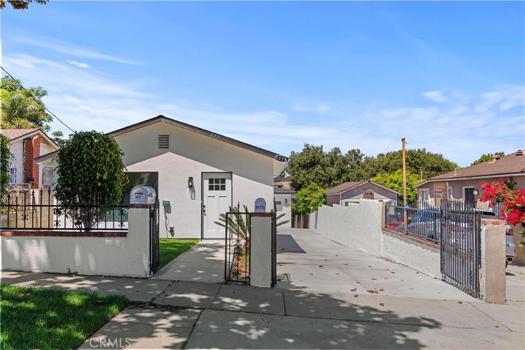 Fully remodeled and designed with contemporary style, this rare Inglewood offering features two separate homes with their own addresses on one lot—perfect for multi-generational living or generating rental income. The front home is a brand-new build, while the back home has been beautifully updated. Both units have their own laundry and separate utilities (shared water only). The back unit includes an attached two-car garage. Interiors boast modern finishes, open-concept layouts, and inviting atmospheres, with sleek kitchens, and quartz countertops. Both homes are vacant and ready for you or your tenants. Situated in a quiet neighborhood near a park, this turnkey property combines comfort, style, and income potential in one package.