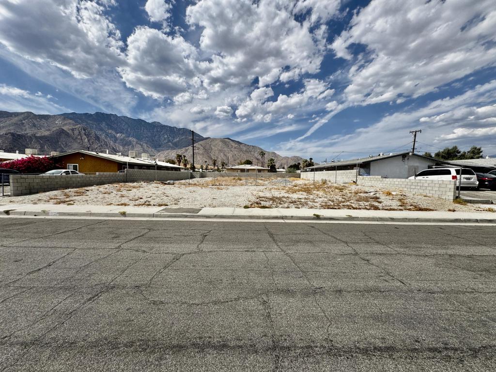 Why settle when you can design your dream home from the ground up? Purchasing a vacant lot gives you the freedom to create a custom living space tailored to your unique vision and lifestyle. Imagine designing every detail--your perfect floor plan, outdoor space, and even those stunning mountain views! This lot offers no HOA fees, and you own the land. With close proximity to the freeway, Palm Springs International Airport, and Downtown Palm Springs, the location is ideal for convenience and access. Take control of your budget, materials, and timing, and build something truly special you'll love. Don't wait--start turning your dream into reality today! NOTE:The lot is located a few streets down from where Miralon is being built. Owner has plans to build a 1,800 sqft. home with 3 bedrooms, 2 baths and a ADU with a living room, 1 bedroom and 1 bath. (They will convey with the purchase.) Approved by the city. Stamped 03-31-2023. Buyer to conduct all their due diligence in this matter with the city. Side block walls and chain link fence installed in 2023.