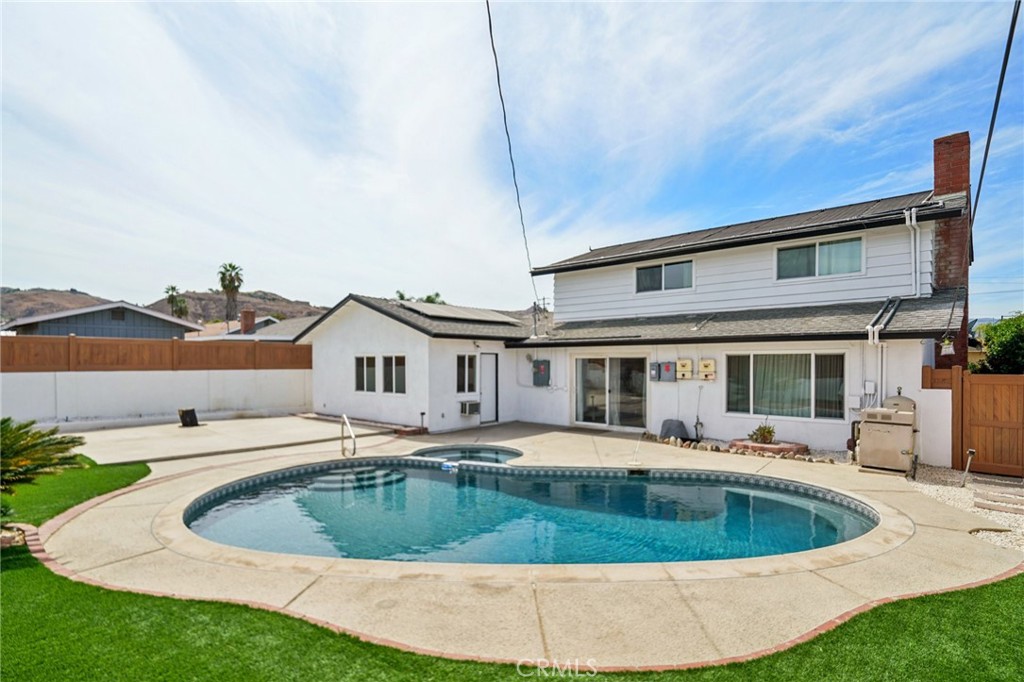 Welcome to this expansive 6-bedroom, 3-bathroom pool home in Riverside, perfectly located near schools, shopping, the 91 freeway, and even a local theme park! This property is ready for your personal touch and offers plenty of room to grow.
Step inside to a bright and inviting living room where you can relax by the cozy fireplace on cool evenings. The open-concept kitchen flows seamlessly into the dining area, making gatherings and entertaining effortless.
The downstairs level features the primary suite, two guest bedrooms, and a full guest bath. Behind the garage, you’ll also find a private living space currently being used as the sixth bedroom—perfect for guests, extended family, or a home office.
Upstairs, you’ll discover two additional bedrooms, including one oversized room that would make an ideal game room, media space, or playroom. Natural light floods the home through the many large windows, creating a warm and welcoming atmosphere.
Step outside and enjoy the California sunshine in your own backyard oasis! The sparkling pebble-tech pool and spa are perfect for summer fun, with ample space left for entertaining, BBQs, and gatherings. Buyer to assume solar lease. 13 years left.
Recent upgrades include:
Newer roof, Fresh interior paint & updated flooring, New windows for energy efficiency
, Low-maintenance vinyl fencing.
This is a rare opportunity to own a large pool home with so much potential in Riverside. Don’t wait—schedule your private showing today!