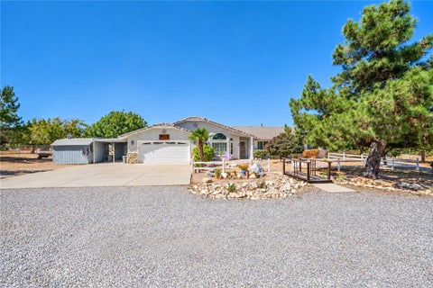 Photo of 9030 Verbena Road, Oak Hills, CA 92344 (MLS # HD26216624)