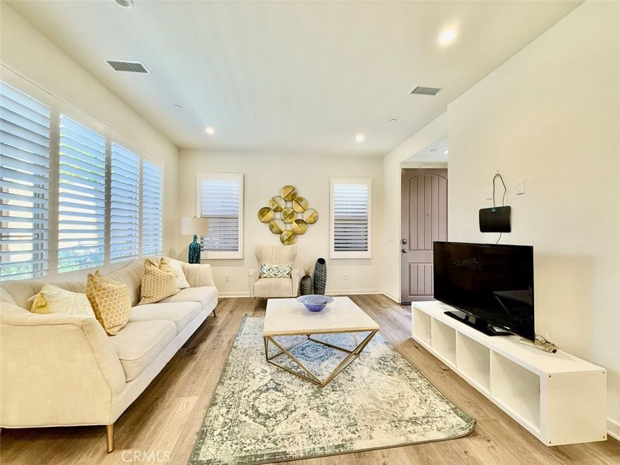Nestled in the highly sought-after Portola Springs neighborhood, this exquisite 3-bedroom, 3-bathroom detached condo offers a perfect blend of modern luxury and convenience. Step into a bright and inviting living space featuring elegant wood flooring throughout the first level. The gourmet kitchen is a culinary enthusiast’s dream, showcasing premium upgrades such as sleek quartz countertops, a spacious walk-in pantry, an expansive center island, and top-of-the-line Bosch stainless steel appliances, including a built-in refrigerator.

The low-maintenance backyard provides a tranquil retreat, perfect for relaxing after a long day. Ideally situated, this home offers easy access to major freeways, local shopping, dining, and entertainment options. Families will also appreciate the proximity to award-winning schools, making it an excellent choice for those seeking top-tier education.

This rental property is fully furnished and equipped with high-quality furniture and appliances, offering a true "move-in-ready" experience for tenants. Simply bring your personal belongings and start enjoying your new home from day one.