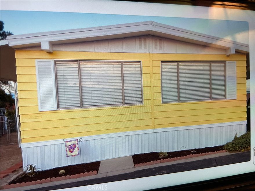 This 55 and over Senior Community has a Turn-key unit available for quick occupancy. The Park Manager has been on premises for 20+ years. It has brand new Laminate Floors Throughout with freshly painted Ceilings. Both Bathrooms have new Toilets with new water- saving Faucets & Fixtures. A Brand New Dining Room Chandelier has been installed. There is a Newer Central Heat & Air-Conditioner unit in this Home along with a Swamp Cooler in the Family Room Area. The Owner has also had the Plumbing Lines Re-piped. New Overhead Lighting has been installed in the Kitchen. The Kitchen also has a brand new Stainless Steel Farmhouse Kitchen Sink, along with a matching new Dishwasher and Range Top. The stove top also has a new Hood Ventillation. New beautiful, white subway tile backsplash installed in the kitchen! There is a backyard chain-linked Fence on the property, for Pets and your Outdoor Privacy. To complete this List of improvements, the complete Exterior has been freshly Painted along with the Driveway. There is a 10’ by 12’ Storage Shed at the end of the Driveway that is included in the Sale. There is a Fenced Community Swimming Pool for all Owners, who may invite their guests to join them. There are Washer and Dryer Hook-ups in the home but there is also a Laundry Area available to use on-site. The Park has a peaceful, quiet ambiance. Must see to Appreciate!