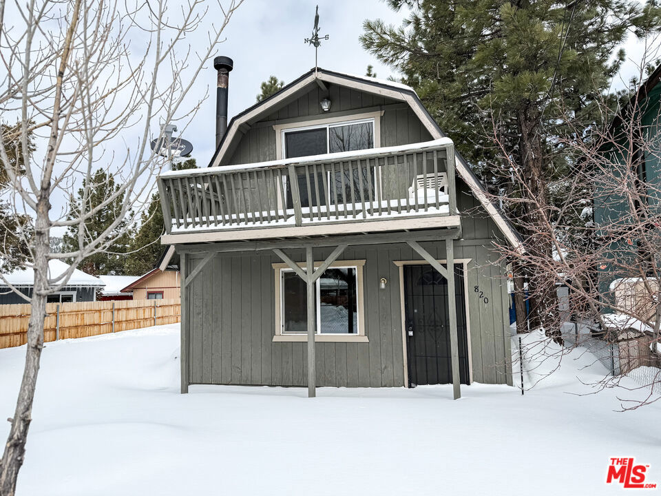 Great property at a great price point! Escape to this charming cabin in the woods located in a peaceful neighborhood just 15 minutes from downtown. This two-bedroom, one-bath grambel style cottage, features an open floor plan downstairs connecting the bathroom, laundry, living, and kitchen areas. A wood-burning stove in the living area provides a cozy warm feel during the winter. All bedrooms are located upstairs for peace and quiet. Included in the sale price is a 2300 sq ft lot, providing ample space for parking or RV/boat storage. A large rear shed offers plenty of space for tools or gear. Don't miss the chance to make this delightful getaway your own! Schedule your viewing today and discover the endless possibilities this home has to offer.