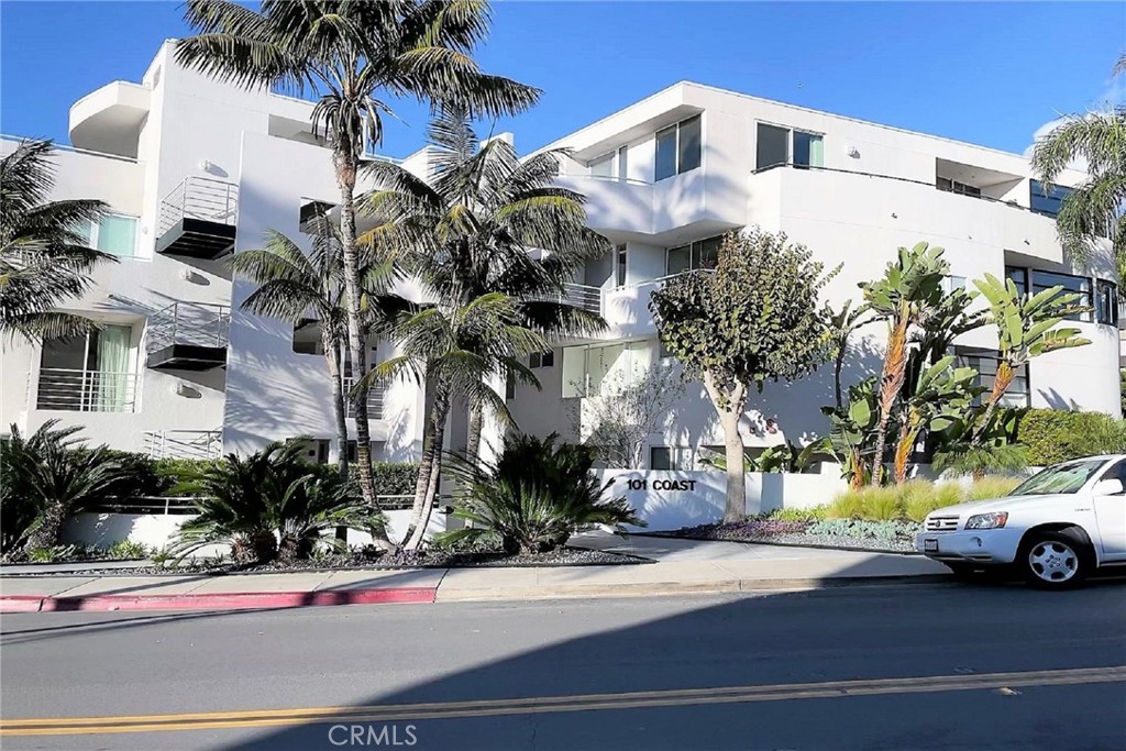 FULLY FURNISHED. Gorgeous 4th floor single level penthouse unit with ocean view just steps from the sand. Open floorplan with 2 bedrooms and 1.75 baths. Located directly across from access path to Windansea Beach. Walk to La Jolla Village with its wonderful restaurants, shops and art galleries or enjoy a breathtaking walk along the ocean with rock formations, tide pools and whitewater views. Unit was remodeled a few years ago and has an updated kitchen with designer appliances: SubZero refrigerator, Bosch dishwasher, Wolf stovetop, oven and microwave; shaker cabinets; wine refrigerator. Elegant countertops are dolomite granite with waterfall edges. Beautiful wood floors throughout. Impeccably furnished and move-in ready with barstools, dining set, Smart TVs in living room and both bedrooms. Bedrooms have Enso electric beds and closets by California closets. Living room with fireplace and floor to ceiling windows plus access to balcony. Master bathroom has two sinks, stone countertops and natural stone flooring accenting a dramatic soaking tub and shower. Separate laundry room includes LG washer and dryer. Unit is in an impressive, well-maintained four-story building with security gate, elevator and two garage spaces. Adjacent to the building’s common area fourth floor deck which features a grilling area, firepit with seating, dining table and ocean views.