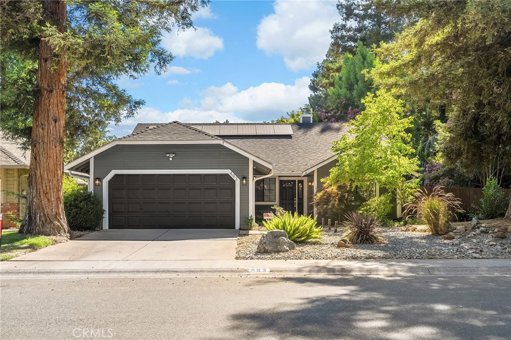 Welcome to this charming 3-bedroom, 2-bath home, offering 1,705 sq ft of comfortable living space. Built in 1988, it features a modern open floor plan with a spacious family room and a versatile office/den—perfect for today’s lifestyle. Freshly painted interior and brand-new carpet throughout make it move-in ready. Enjoy energy savings with leased solar panels already in place. The property boasts a beautifully shaded lot with nine majestic redwood trees and a huge side and backyard, ideal for gardening, entertaining, or expansion. The front yard features low-maintenance landscaping, giving you more time to relax and enjoy your surroundings. This home blends comfort, efficiency, and natural beauty—all in one exceptional package. A must-see opportunity