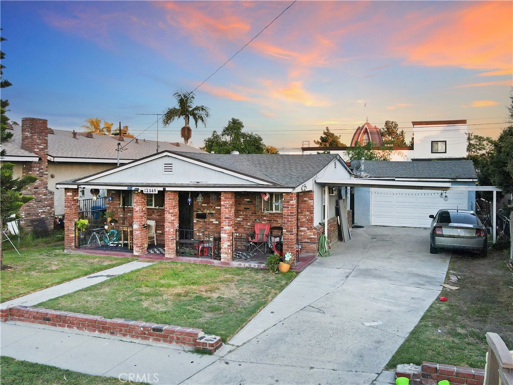 4 bedroom, 2 bath home centrally located in the heart of Downey. The home features a formal living room and a comfortable family room -- perfect for gatherings and relaxing evenings. The kitchen includes a dining area, offering a warm and functional space for everyday meals. Solar panels help keep energy costs low. The propertyb also has a long wide driveway with covered parking and a 2 car garage. Conveniently located near Downey Promenade and Downey Landing, with easy access to shopping, dining, and entertainment.
