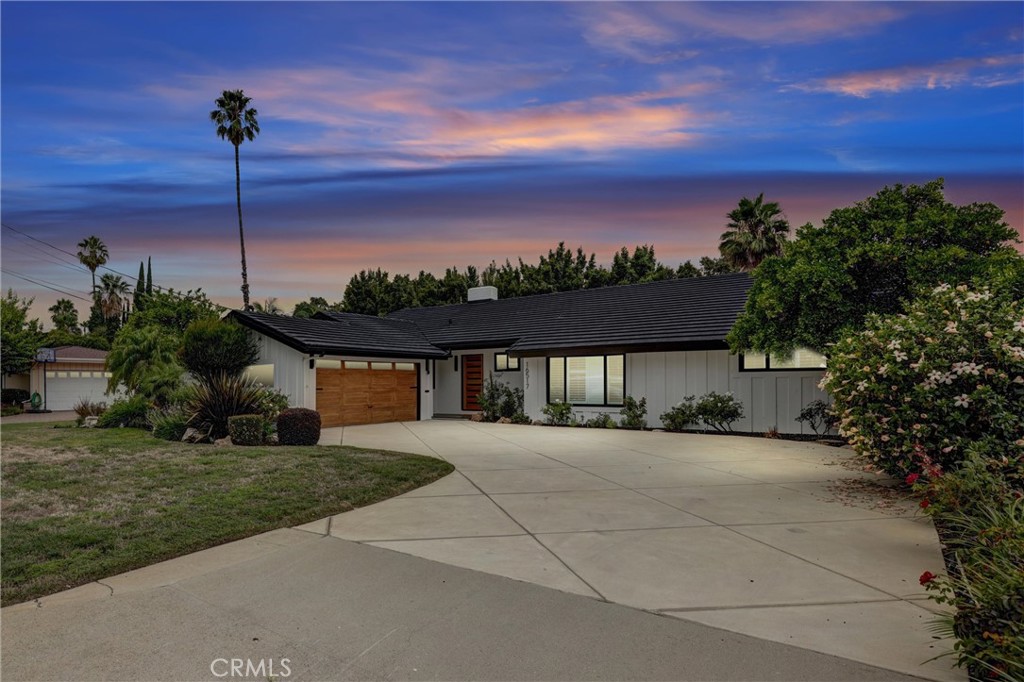 Welcome to 16517 Hartsook St — a thoughtfully updated 5-bedroom, 4-bathroom home. This spacious residence offers 2,825 sq ft of elegant living space on a generous 9,790 sq ft lot, blending luxury, comfort, and convenience in one of the Valley’s most desirable neighborhoods.
Step inside to an open, light-filled layout featuring hardwood floors, recessed lighting, and a seamless indoor/outdoor flow. The modern kitchen boasts spacious underlit-cabinetry, quartz countertops, and high-end stainless-steel appliances — perfect for entertaining or casual family meals.
The expansive living and dining areas lead directly to a private backyard retreat, ideal for alfresco dining by the pool surrounded by mature trees.
Located just minutes from Balboa Golf Course, Lake Balboa Park, and the serene SuihoEn Japanese Garden, this home offers access to some of the Valley’s best recreation. You'll also enjoy the endless shopping, dining, and wellness options along Ventura Blvd — all just around the corner.
Families will appreciate proximity to top-rated private and charter schools, and commuters will love the quick access to the 101 and 405 freeways.
This is your opportunity to own a move-in ready home in one of Encino’s most convenient and prestigious pockets. Schedule your private showing today!