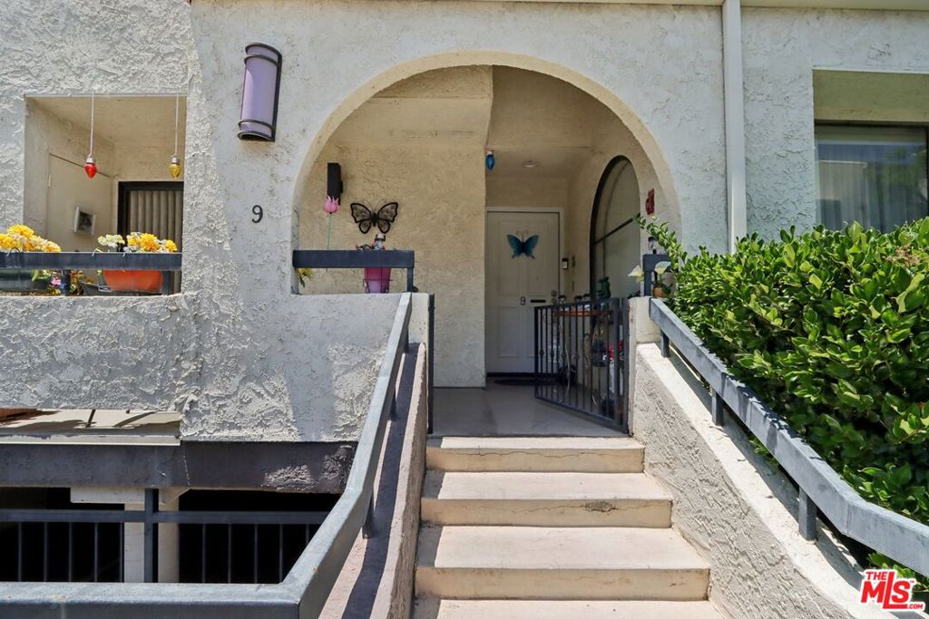 Stylish 3-Bedroom Townhome in Prime Woodland HillsWelcome to 21620 Burbank Blvd #9, a beautifully maintained and spacious townhome offering 1,595 sq ft of comfortable living in the heart of Woodland Hills. This multi-level home features 3 bedrooms, 2.5 bathrooms, and a smart, open floor plan that blends functionality with style.Step inside to find a sun-drenched living room with soaring ceilings, a cozy fireplace, and sliding glass doors that lead to your own private patioperfect for relaxing or entertaining. The elevated dining area flows into a well-appointed kitchen with granite countertops, stainless steel appliances, and ample cabinet space.Upstairs, all three bedrooms are generously sized, including a luxurious primary suite with vaulted ceilings, a walk-in closet, and an en-suite bathroom. Additional features include in-unit laundry, a direct-access two-car garage, and central A/C and heat.Set within a secure gated community, residents enjoy access to amenities such as a sparkling pool and spa. Located just minutes from Warner Center, The Village, Westfield Topanga, top-rated schools, and freeway access, this townhome offers the best of Woodland Hills living.Don't miss out on this turnkey gem in one of the area's most desirable neighborhoods!