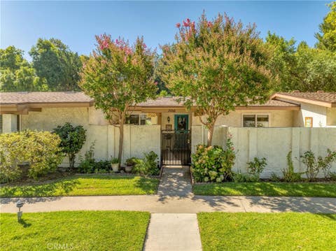 Photo of 19368 Avenue Of The Oaks, Newhall, CA 91321 (MLS # SW26159947)