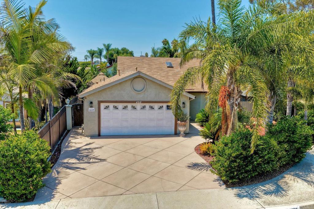 STUNNING 4BR VISTA HOME WITH PRIVATE PATIOS & RESORT-STYLE BACKYARD! SOLAR WITH POWER WALL IS PAID FOR. Discover your dream home at 498 Huff Street! This beautifully designed 4-bedroom retreat sits on gorgeously landscaped grounds in desirable Vista. What sets this home apart? Every single bedroom opens to its own private patio through elegant French doors, creating seamless indoor-outdoor living that's perfect for morning coffee or evening relaxation. Step into the backyard oasis featuring a charming gazebo, soothing fountains, and cozy fire pit where you'll love hosting gatherings or unwinding after long days. The thoughtfully designed interior boasts widened doorways and accessibility features throughout, making this home welcoming for everyone. This versatile property offers incredible flexibility with its well-planned layout and has been meticulously maintained. Whether you're seeking a forever home, multigenerational living space, or investment opportunity, this move-in ready gem delivers endless possibilities. The combination of privacy, outdoor entertaining space, and thoughtful design makes this Vista home a rare find. Don't miss your chance to own this special property where comfort meets functionality in perfect harmony! Schedule your showing today and prepare to fall in love! Note: Info deemed reliable but not guaranteed. Buyer’s agent to verify.
