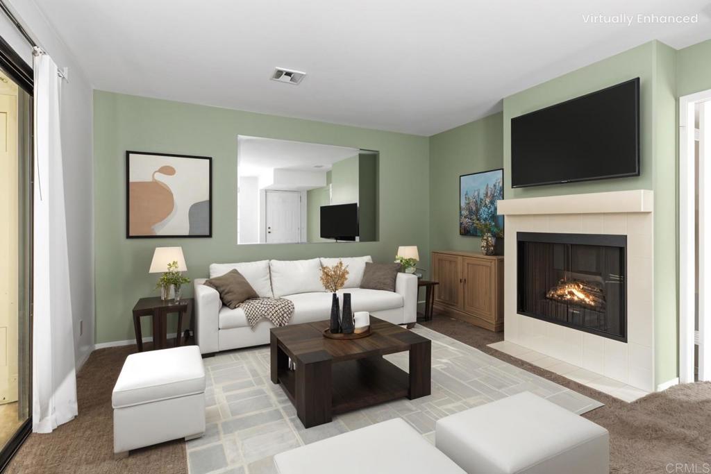 Priced To Sell - Welcome to Terra Vista, a highly sought-after community in beautiful Rancho Peñasquitos, ideally located just minutes from the 15 and 56 freeways. Residents enjoy resort-style amenities including sparkling pools, relaxing spas, a sauna, fitness center, meeting room, and more. This bright and inviting second-floor end unit is filled with natural light and offers 572 sq. ft. of well-designed living space, featuring 1 bedroom and 1 bathroom. The cozy fireplace adds warmth and charm, while a private balcony provides the perfect spot to enjoy your morning coffee. The stacked laundry closet is located on the patio and offers everyday convenience. One nearby covered parking space is included. With its excellent location, thoughtful layout, and welcoming community, this home offers the perfect blend of comfort and low-maintenance living. Great area of San Diego near shopping and restaurants. Located in the award winning Poway Unified School District.