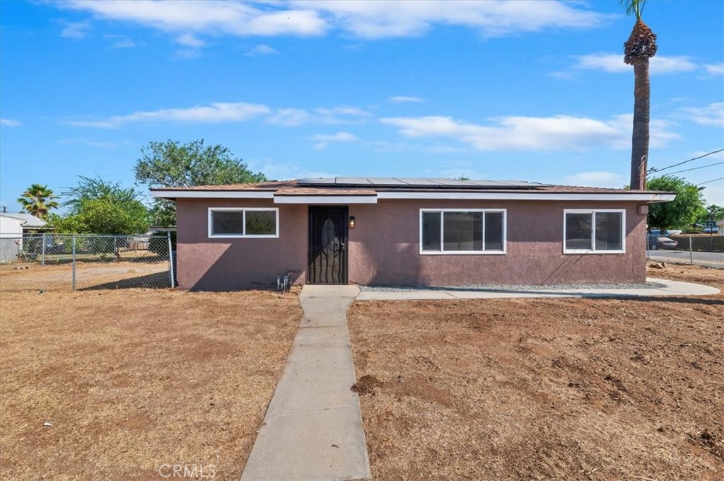 Remodeled Duplex-Style Home with $80k PAID OFF solar! – Total of 6 Bed, 4 Bath | Ideal Investment or Multi-Generational Living
Welcome to this remodeled and move-in ready duplex-style home featuring a total of 6 bedrooms and 4 bathrooms across two spacious units. With modern upgrades throughout, this property offers flexibility, comfort, and strong rental or multi-family potential. Unit 1 has been tastefully renovated and offers 4 generously sized bedrooms and 2 full bathrooms, including a primary suite with private bathroom. The open-concept living and dining area flows into a beautifully updated kitchen featuring quartz countertops, and new cabinetry. Fresh flooring, contemporary finishes, and updated lighting create a warm and inviting space. Unit 2 has some recent upgrades and includes 2 bedrooms and 2 full bathrooms, huge livingroom area, featuring a private en-suite bathroom in the primary bedroom. A spacious kitchen with ample cabinet and counter space makes this unit both functional and inviting—perfect for guests, extended family, or potential rental income. Don’t miss this turn-key opportunity in a desirable location in Jurupa Valley—live in one unit and rent the other, or maximize rental income with both!