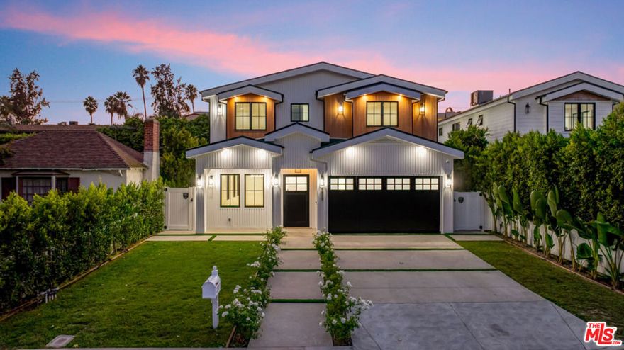 This New Construction  is  a showcase of impeccable design and craftsmanship in the sought-after Sherman Oaks flats. Every inch has been thoughtfully curated, with no detail overlooked, blending timeless elegance with modern sophistication. Inside, stunning herringbone hardwood floors set the tone for refined living, flowing seamlessly through spacious, light-filled interiors. The open-concept kitchen and family room are the heart of the home, designed for both comfort and style. A chef's dream, the kitchen features top-of-the-line Thermador appliances, a pot filler, and a Butler's  walk-in pantry . The seamless indoor-outdoor connection leads to a beautiful, private backyard, an expansive retreat with a sparkling pool, spa, and generous grassy area, perfect for gatherings or quiet relaxation. With 5 bedrooms and 6 bathrooms, the home offers exceptional space and privacy. The primary suite is a true sanctuary, complete with soaring ceilings, a massive walk-in closet, a makeup vanity, designer lighting, and a spa-like bathroom featuring a freestanding soaking tub. Beyond the home itself, the location is simply unbeatable. It is just a short stroll to Equinox, Erewhon, and some of the best shopping, dining, and entertainment that Studio City and  Sherman Oaks have to offer. A rare opportunity to lease a residence of this caliber in the heart of the Valley. Some of the rooms and backyard have been digitally staged.