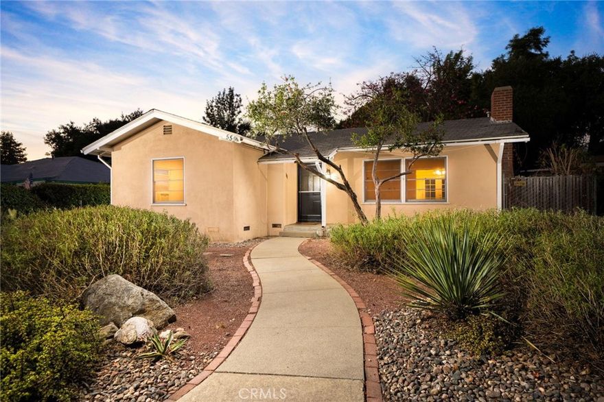 Classic Charmer In The Heart Of The Claremont Village. This charming home combines practical living with a thoughtful layout, presenting a fantastic opportunity to live in the Claremont Village. The front yard features drought tolerant landscaping with a winding pathway leading to the main entry. Inside, newly refinished hardwood floors and a freshly painted interior make a striking impression. The living room is expansive and overlooks the front yard through large windows that bring in natural light. A brick-lined fireplace anchors the room, creating a welcoming focal point. The dining room connects directly to the backyard, allowing for easy indoor-outdoor flow when hosting or dining. The kitchen is spacious with extensive countertop and cabinet space. Stainless steel appliances include a built-in range, dishwasher, and refrigerator. The layout supports everyday use and meal preparation with generous work surfaces and ample storage. A window over the sink brings in daylight, enhancing the open feel of the space. The home includes three bedrooms and two bathrooms. The two secondary bedrooms are comfortably sized and filled with natural light. The primary suite offers direct access to the backyard and provides space for a sitting area or small workspace. A gated driveway along the side of the property provides access to the detached garage with an extra storage/workshop space. The backyard is a pleasant and private setting with plenty of space for enhancement and creative improvements. Its open layout offers flexibility for gardening, recreation, or outdoor dining. A brick lined concrete patio provides a comfortable area to lounge or host gatherings. With space to create custom landscaping or expand outdoor living areas, the yard presents an opportunity to tailor it to your vision. The possibilities are open for both relaxation and entertaining in this well-located property, close to shopping, dining, public schools, and the Claremont Colleges.