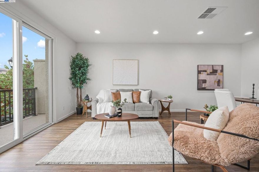 Welcome to 2336 Carbondale Way — a stunning tri-level condominium nestled in the heart of Dublin. Built in 2015, this contemporary 4-bedroom, 4-bath home offers 1,954 sq. ft. of thoughtfully designed living space with an open, versatile layout.  The entry level features a convenient bedroom with an ensuite bath, ideal for guests or a private home office. On the main level, enjoy a bright, airy living area that flows seamlessly into a gourmet kitchen equipped with stainless steel appliances, sleek countertops, and a large island—perfect for meal prep or casual entertaining. Upstairs, the primary suite boasts a spacious walk-in closet and a luxurious ensuite bath, while additional bedrooms offer comfort and flexibility for family or guests.  Step outside to a private patio or make use of the attached 2-car garage for easy parking and storage.   Located within walking distance to Cottonwood Creek Elementary and minutes from BART, top-rated schools, San Francisco Premium Outlets, and major freeways, this home combines modern style, comfort, and convenience—perfect for today’s lifestyle.