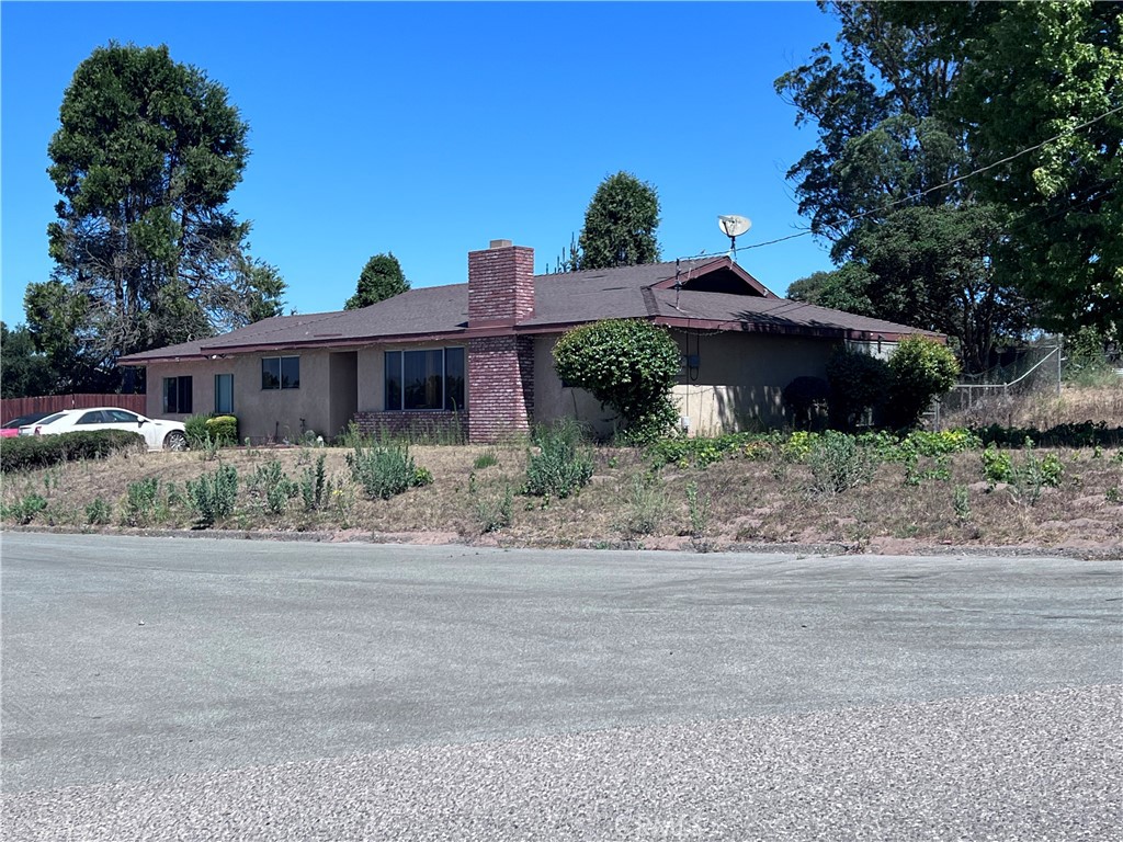 ATTENTION BUYERS: ACTIVE PROBATE SALE - Looking for cash or financed offers. Auction date: 9/2/25. We are working on getting that date extended. Buyers are encouraged to submit offers at their highest and best. Probate Court Approval required. The Probate Attorney is handling the legal eviction of the current tenant and it is in its final phase. Showings will happen thereafter. This spacious one story home features 3 bedrooms, 2 bathrooms, and 2,124 square feet of living space, situated on a large 35,100 square foot corner lot. The property includes a functional kitchen, living room with a fireplace, a large family room, a dining room, as well as an indoor laundry room. Built in 1978, the home offers significant potential and will benefit from some updates. Additional highlights include a detached 4-car garage with a half bath and plenty of RV parking. The property is connected to city water, has a septic system, and is serviced by natural gas.