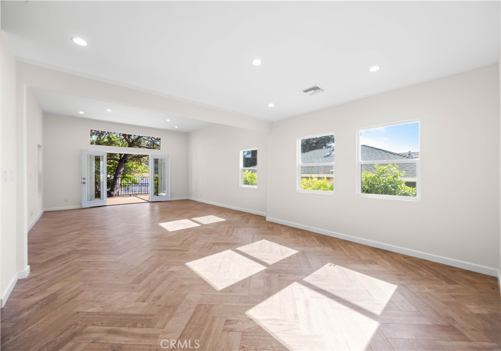 Completely brand-new remodeled house on a large corner lot, in one of the most desired Tujunga neighborhoods. Close to shopping, restaurants and schools. This beautiful house features a nice open floor plan concept. Bright and spacious with lots of natural light. Engineered hardwood floors and recessed lighting throughout. High ceilings. Tastefully designed kitchen with marble countertops and a gorgeous island. Plenty of cabinets. Top of the line brand new kitchen appliances and in unit washer dryer included. Three generously sized bedrooms and two full bathrooms. Nicely designed master bedroom with walk in closet and a gorgeous bathroom. Lovely outside spacious deck. This gorgeous house has two yards front and back, a true entertainer house. Plenty of fruit trees. Driveway and detached garage. A true gem. This will not last long. Call me today to schedule your tour.