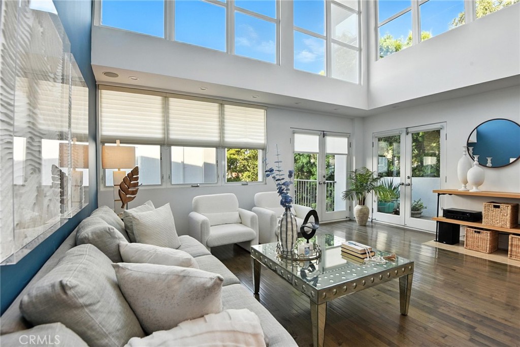 Introducing an exceptional opportunity for the discerning buyer seeking refined coastal living. This exquisite, corner townhome—masterfully designed by acclaimed architect William Brantley—offers a rare blend of sophistication, privacy, and sweeping ocean views.
Enjoy the ambiance of a single-family residence with the convenience of townhome living, just moments from the beach and the vibrant energy of Santa Monica’s Main Street. Whether you’re savoring a quiet morning coffee or hosting an elegant evening gathering, five private outdoor spaces—including a spectacular rooftop terrace—provide the perfect setting for relaxation and entertaining.
Inside, the residence is bathed in natural light from dramatic two-story ceilings, creating an airy, inviting atmosphere. The flexible layout features two spacious bedrooms, a versatile loft, and two and a half beautifully appointed bathrooms. The gourmet kitchen is a chef’s delight, seamlessly connecting to the open dining area and patio for effortless indoor-outdoor living.
Thoughtful upgrades abound, including rich hardwood floors, designer finishes. A private, direct-access two-car garage, generous walk-in closets, and ample storage further enhance the home’s appeal.
This is a rare chance to own a meticulously updated, architecturally significant home in one of Santa Monica’s most coveted locations—crafted for those who demand the very best.