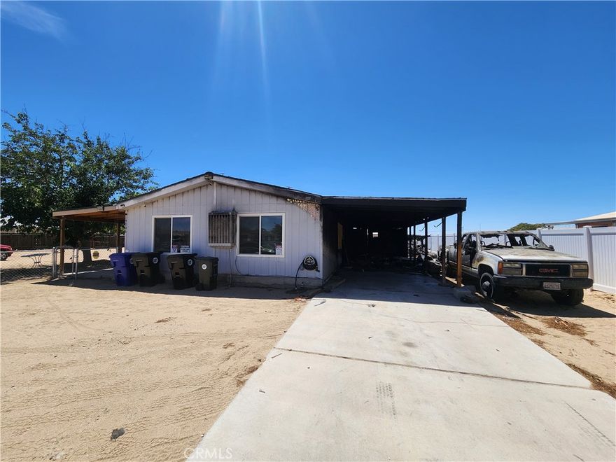 FIXER UPPER!! Property has major burn damage. Manufactured home on a permanent foundation, this 1,296 sqft  2 bed 2 bath home sits on its own land.