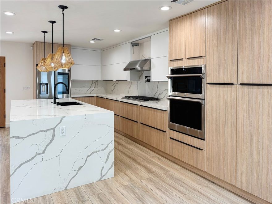 Exquisite Modern Oasis in Prime Woodland Hills!

Welcome to 22539 Dolorosa St a beautifully reimagined 4-bedroom, 2.5-bath single-story home spanning nearly 2,000 square feet of refined living space. Set on a private, gated lot in a desirable pocket of Woodland Hills, this residence blends modern design with smart functionality for today’s lifestyle.

Step inside to an open-concept floor plan flooded with natural light, highlighted by skylights, recessed lighting, and tasteful finishes throughout. The extraordinary chef’s kitchen is the heart of the home, featuring a massive breakfast island, quartz counters, and stainless steel appliances  ideal for entertaining and culinary creativity.

The spacious bedrooms come with custom built-out closets, while the designer bathrooms combine elegance with comfort and practicality. Indoor-outdoor living is effortless, thanks to a surround sound system inside and out, creating the perfect atmosphere for gatherings.

Your private backyard oasis awaits with a SPARKLING POOL AND SPA, framed by mature landscaping for total serenity. A DETACHED BONUS ROOM offers endless flexibility whether for extended guests, a home office, studio, or rental opportunity.

Enjoy modern amenities like central air & heat, a 16-camera security system, and sleek laminate wood floors throughout. This turnkey home offers privacy, smart use of space, and stylish comfort — all within minutes of shops, restaurants, award-winning schools, and Ventura Blvd.