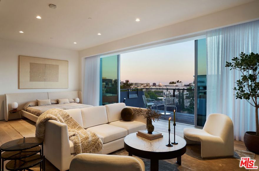 Experience the ultimate lock-and-leave luxury at Residence 5F, a studio pied-a-terre at 8899 Beverly. Designed by Olson Kundig as a "Love Letter to Los Angeles," this LEED-certified haven offers a sunny south-facing layout, and a floor-to-ceiling window wall. Sliding doors open to a terrace for seamless indoor-outdoor living. Perfect for jet-setters, the studio includes a spa-like primary bath with Italian travertine and soaking tub, plus a guest bath, built-in wardrobe, and in-unit laundry. Premium Sub-Zero, Miele, and Gaggenau appliances complete the sleek kitchen. Enjoy round-the-clock concierge, valet, a state-of-the-art fitness center, and a lush quarter-acre pool and spa oasis. Stroll to world-class dining, shopping, and the new Stella Restaurant located in the building. If you're looking for a no-fuss, high-style L.A. home base, this is it. Contact us for a private viewing today.