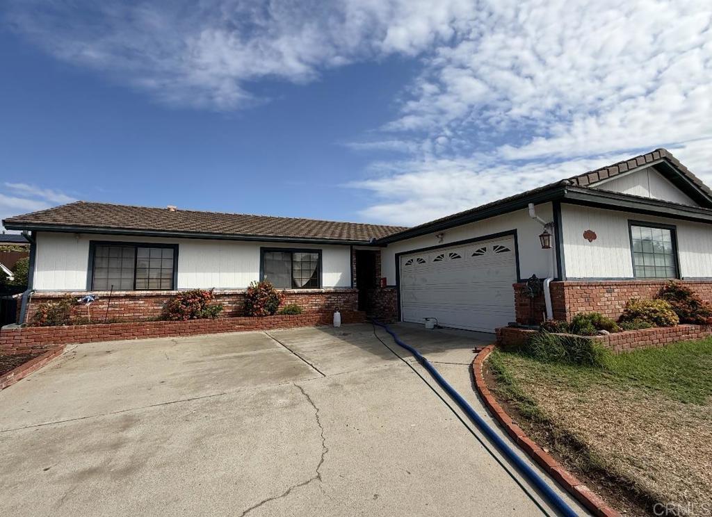 Priced to Sell! Welcome to this spacious 4 bedroom, 2 bath home offering 2,108 sq ft of living space in a sought-after neighborhood. This property features important updates including a newer tile roof & windows, providing peace of mind for the next owner. Inside, you’ll find generously sized rooms, a functional floorplan, and great natural light throughout. The large living areas create an inviting atmosphere, perfect for entertaining or relaxing at home. The bedrooms are well-proportioned, offering flexibility for family, guests, or a home office. With a little TLC, this property offers an incredible opportunity to create the home of your dreams. Don’t miss the chance to turn this house into your dream home—call today! This is a must see!