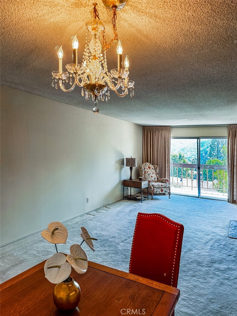 Top-Floor View Condo in Coveted Sparr Heights
Location, location, location, plus views for days! Nestled in the scenic hills of Glendale’s highly sought-after Sparr Heights neighborhood, this top-floor diamond in the rough offers a rare blend of privacy, space, and potential.
The spacious formal living room features a charming fireplace and opens onto a balcony where you’ll enjoy breathtaking mountain views, perfect for enjoying summer nights with friends and family. An open-concept layout flows seamlessly into the dining area and wet bar, creating an ideal space for entertaining.
The primary suite is a true retreat, boasting a private balcony for your morning coffee, ample closet space, and an en-suite bathroom featuring a double vanity, soaking tub, and generous cabinetry. The versatile second bedroom is perfect as a guest room or home office, with easy access to the hallway bathroom, which includes a stand-up shower.
The kitchen is ready for your personal touch but offers great bones and layout potential, while the in-unit laundry area provides washer and dryer hookups for added convenience.
Community amenities include a sparkling pool and spa, a fitness center, sauna, recreation room, cozy library, and a welcoming reception area, all tucked within a beautifully landscaped complex. Your two covered side-by-side parking spaces are located in the secure gated garage, and visitor parking is available at the front of the building.
Located just moments from the shops, cafés, and weekend farmers market of Montrose Village, and with quick access to the 2 and 210 freeways, you’ll enjoy a lifestyle of comfort, convenience, and connection to nature.
With unbeatable location, community charm, and endless potential. this is the view condo opportunity you’ve been waiting for!
HOA includes water, gas, trash & common areas
Come see what might be!