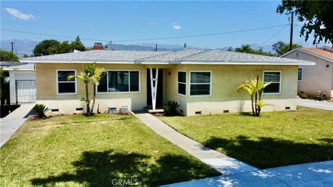 Photo of 205 E Cypress St, Covina, CA 91723 (MLS # PW26180921)
