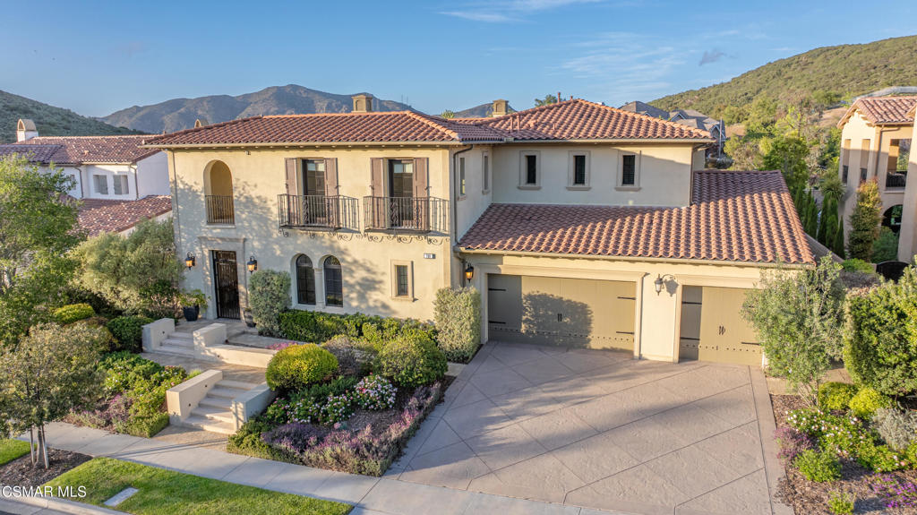 Stunning Private Estate in Exclusive Gated Sedona at Dos Vientos Ranch! Spacious Plan Offers 5,770sf w/Over $400k in Upgrades incl. Custom Pool & Spa w/Limestone Coping and Auto Cover and an Adjacent Outdoor BBQ Island. This Immaculate Home Features an Open Flowing Floor Plan with Soaring 12-Ft Ceilings. Exquisite Designer Details Convey the Home's Fine Craftsmanship w/Custom Tile & Cabinetry Work and Grand Scale Premium Quality Doors & Windows. Gourmet Chef's Kitchen w/Oversized Island, Granite, Stainless Thermador Appliances and Large Pantry. The Adjoining Family Room Has a Fireplace and French Door to Outdoor Pavilion. Formal Living Room Magnificent Fireplace w/Soaring Custom Mantel and Cathedral Ceiling. There's also an Indoor/Outdoor Gym, and a Stylish Billiard Room (or Formal Dining). The Over-Sized Master Suite has a Recessed Ceiling, Sitting Area & Large Balcony Deck w/Views. The Spa-Quality Bath has a Soaker Jetted Tub, Oversized Walk-In Dual-Head Shower, Double Vanity and Large Fully Built-Out Walk-in Closet. Exquisite Stonework, Custom Draperies and Wallpaper Frame the Luxurious Setting. All of the Bedrooms are Ensuite w/Personalized Bathrooms, Custom Shutters or Drapes and Designer Light Fixtures. The Outdoor Patio Overlooks the Pool. Large Recreation Room or Upstairs Den, w/Wood Floor & Beam Ceiling. Expansive Private Yard with Amazing Valley Views, Front Courtyard with Cozy Fireplace, Big Side Yards, Backyard Fire Pit Sitting Area and Grass Area Backs to Green Belt w/Views for Privacy. Indoor/Outdoor Year-Round Living. Prime Location w/Easy Access to Trails and State Park w/Spectacular Mountain and Ocean Views from Ridge Across from the Home. Sparkling Swimmer's Pool, Lush Landscaping and a Coveted Three-Car Side-by-Side Garage. Large Laundry w/Cabinets, Sink and Folding Counter. An Exemplary Estate w/Amenities and Privacy Beyond Compare. Close to Shopping and Services, w/Sycamore Canyon K-8 Calif. Distinguished School, Parks and 11 miles to the Ocean. Thirty minutes to Malibu and Channel Islands Harbor or a Country Road to Westlake Village. Private and Prestigious, Call for an Appointment Today!