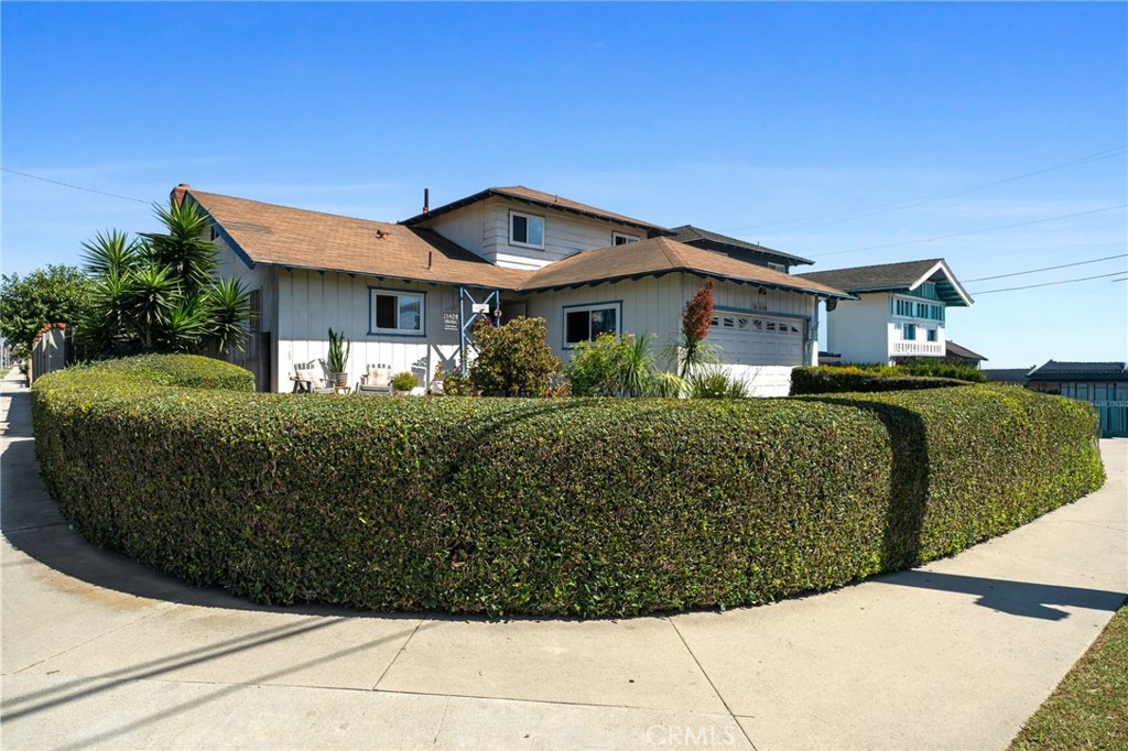 WELCOME to 21248 Martin Street. This CORNER LOT, TWO-Story Home offers over 1,800 square feet of living space, plus an extra cool BONUS ROOM. The well-manicured landscaping provides privacy as you’re welcomed into the property. Upon entering, the KITCHEN will be to your left, and is OPEN to the DINING AREA, creating a great space for ENTERTAINING your guests. The SPACIOUS LIVING ROOM has sliding doors to the BACKYARD. TWO BEDROOMS and a FULL BATHROOM complete the 1st Level. On the 2nd Level, you will find the PRIMARY SUITE, complete with a PRIVATE BATHROOM and a comfortable LOUNGE AREA. In addition, there's a room, perfect for another SPACE TO HANG OUT or have FAMILY or FRIENDS STAY overnight comfortably.