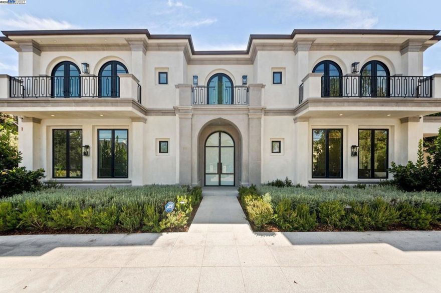 Luxury Redefined: A 15,000-Square-Foot Architectural Masterpiece in Beverly Hills Nestled just off the legendary Sunset Boulevard, where the glamour of Hollywood’s Golden Age meets the modern pinnacle of luxury living, stands a residence that is nothing short of extraordinary. This 15,000-square-foot architectural marvel is not merely a house—it’s a statement, a vision brought to life through unparalleled craftsmanship, exquisite design, and a dedication to perfection that is evident in every detail. This Beverly Hills estate is the embodiment of refinement, a seamless blend of European elegance and California modernity. Every inch of the home reflects an obsessive attention to detail, from the imported Italian finishes to the illuminated details. This is a brilliantly Smart Home, with all the features imaginable. The Architect is by Kami Rezai of Hi Tech Design and Builder/General Contractor by Sean Farahmand of Farahmand Development. Website with details at www.701ncamdendr.com