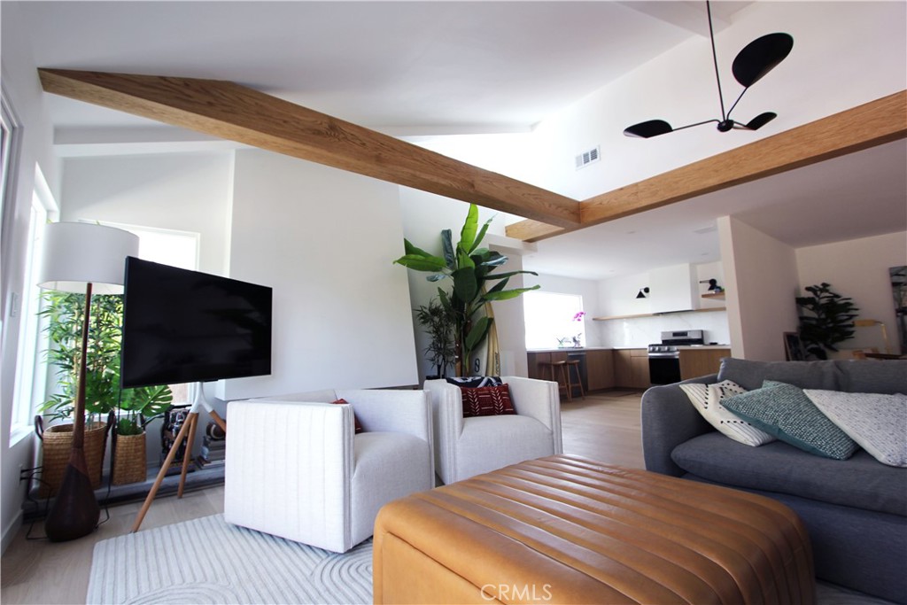 Turn-key & fully renovated! Be the first to enjoy it! Welcome to this architecturally redesigned home in the desirable South Shores neighborhood, offering south and west-facing ocean views (Coastal Living at its finest). Thoughtfully updated with natural light, high-end finishes, this home offers both comfort and style in one of the most scenic areas of Los Angeles. Inside, you'll find: beachy Dutch door, vaulted ceiling, exposed wood beams and a custom plaster fireplace with a wide hearth, drybar, engineered hardwood floors & plantation shutters throughout the home. A chef's kitchen featuring quartz countertops, brand-new stainless steel appliances, and breathtaking ocean views from the adjacent window perfect for enjoying your morning coffee. The hallway bathroom features terrazzo flooring and ceramic tile, while the master bathroom is undergoing a tasteful renovation. There's plenty of driveway parking, an enclosed carport, and a detached garage. The home features a private backyard and a side yard with deck and trellis perfect for enjoying the ocean view. There's a covered porch as well. Exterior landscape currently being installed.
Lease Terms: Tenant pays for all utilities (LADWP: electricity, water, sewage; SoCal Gas). Security deposit equal to one month's rent due at signing. No smoking allowed. Pets considered with an additional deposit (amount based on size). Must provide and maintain proof of renters insurance. Furniture is negotiable if you're interested in a furnished rental.