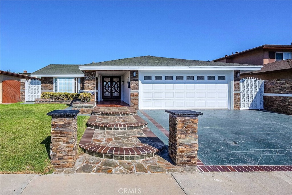 Welcome to this beautifully updated 4-bedroom, 3-bathroom home in Carson, located within the Los Angeles Unified School District. Offering 1,612 sq. ft. of living space on a 4,658 sq. ft. lot, this residence combines style and functionality. A double-door entry opens to a spacious floor plan featuring brand-new flooring, recessed lighting, and modern finishes throughout. The updated kitchen shines with contemporary touches, while the renovated bathrooms provide comfort and elegance. An enclosed sunroom extends the living area, perfect for gatherings, a playroom, or a home office. The attached two-car garage adds convenience and storage. With ample bedrooms and thoughtfully designed updates, this home is truly move-in ready. Ideally situated near schools, parks, shopping, and freeway access, it’s the perfect blend of modern upgrades and everyday convenience.