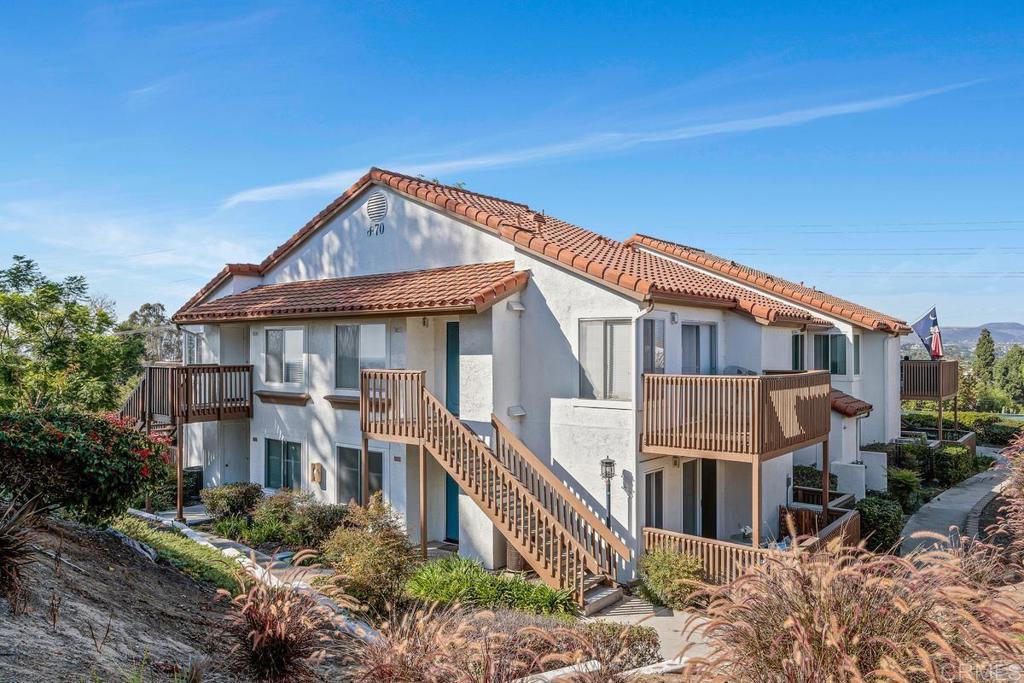 Welcome to this beautifully updated 2-bedroom, 2-bath condo in the highly desirable Sommerset by the Lake community. Recently refreshed with brand new flooring and fresh interior paint, this home is light, bright, and move-in ready. The open concept layout flows seamlessly into the dining and living areas creating a warm and connected space perfect for gatherings. Start your mornings with a cup of coffee on the shaded patio where you can enjoy peaceful scenic views and it is perfect for California's year-round sunshine. The patio is also an inviting space to unwind at sunset, offering the perfect setting for relaxing evenings, enjoying an outdoor meal, and entertaining guests. The spacious primary suite features its own en-suite bath and walk in closet, while the second bedroom offers flexibility for guests, a home office, or hobbies. Fresh updates throughout create a warm, inviting atmosphere that feels like home from the moment you walk in. Added conveniences include an in-unit full-size washer and dryer and detached 1-car garage for parking and extra storage. There is also an assigned parking space. Beyond your front door, the community offers resort-style amenities, including a sparkling pool and spa, tennis courts, picnic areas and a fitness center. Conveniently located near shopping, dining, parks and freeways - everything you need just minutes away. It is also close to the popular Lake San Marcos community which has lovely lakefront restaurants including Amalfi’s on the water, a beautiful golf course, summer concerts by the lake, and the ability to rent gondolas and paddleboards at Lake San Marcos Marina. So many activities and things to do you will love your new home! This condo offers the perfect blend of convenience and accessibility for an effortless lifestyle which makes it such a special place to live. Do not miss out on this wonderful condo. This is truly California living at its best!