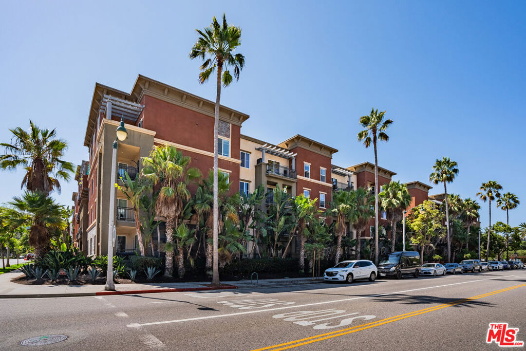 Welcome to this beautifully designed single-level 1 bedroom + den (potential 2 bedroom) home at Tempo in Playa Vista, where modern comfort meets privacy and convenience. From the moment you step inside, you're greeted by an open, sunlit living space that flows seamlessly onto a spacious balcony - your own peaceful retreat with serene treetop views overlooking Runway Rd. The thoughtfully designed layout places the primary suite down the hall for ultimate privacy, offering a tranquil escape with picturesque views and a generous closet. A versatile bonus room adds to the home's appeal, making an ideal space for a potential second bedroom, home office, cozy den, or creative studio. Additional conveniences include an in-unit washer and dryer and tandem parking. Enjoy the best of Playa Vista living with effortless access to trendy shops, top-rated restaurants, Playa Vista Elementary, the library, and more. As a resident, you'll have access to exclusive community amenities, including high-speed fiber optic internet, an Olympic-sized pool, a state-of-the-art fitness center, The Centerpointe Club & The Resort, local shuttle service, and 29 parks with lush green spaces. Don't miss this incredible opportunity to own a stylish, move-in-ready home in one of Los Angeles' most desirable communities!