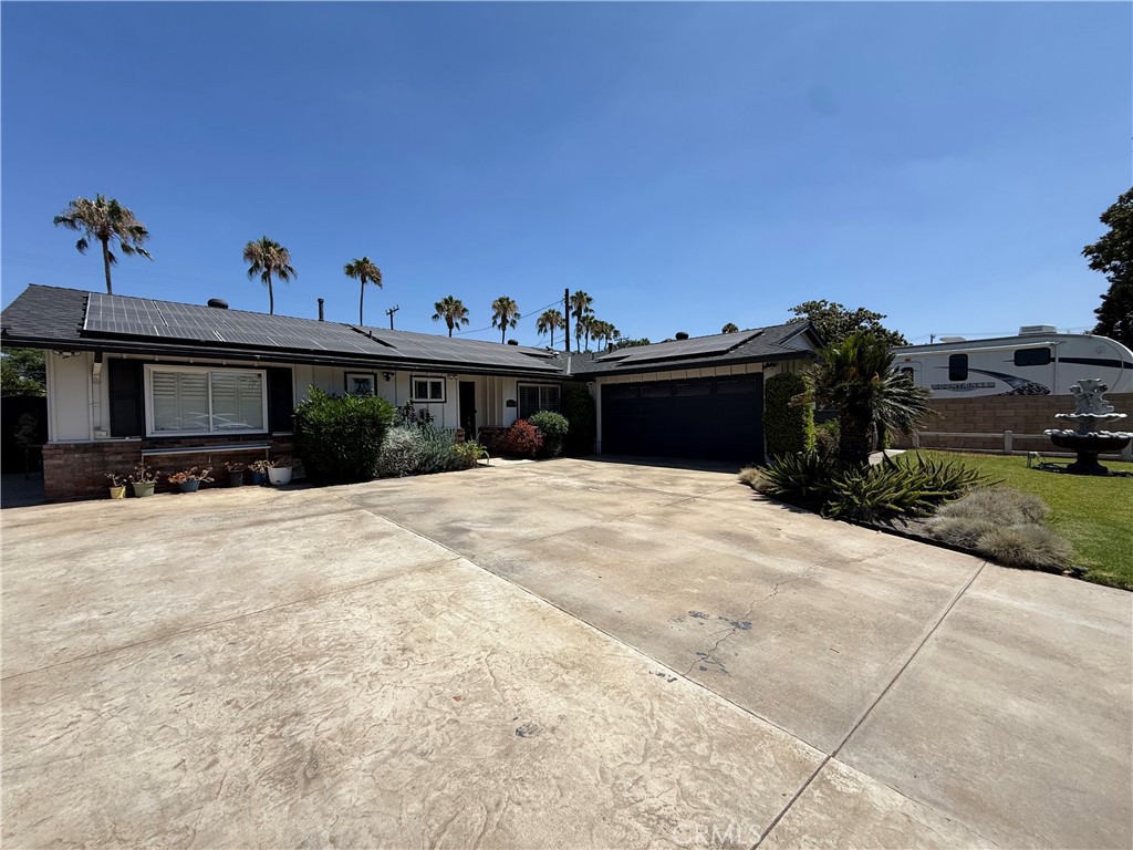 Discover this stunningly remodeled multi-family property nestled in the heart of Anaheim! This spacious estate offers a total of 5 bedrooms and 4 bathrooms, a gorgeous main residence and a fully permitted, private ADU with 2 bedrooms and 2 bathrooms — Home has new Roof and 52 fully paid-off solar panels – enjoy significant utility savings.
Perfect for multi-generational living or rental income. Completely remodeled with modern finishes. Just steps away from a beautiful local park – perfect for morning walks, family outings, or weekend relaxation.