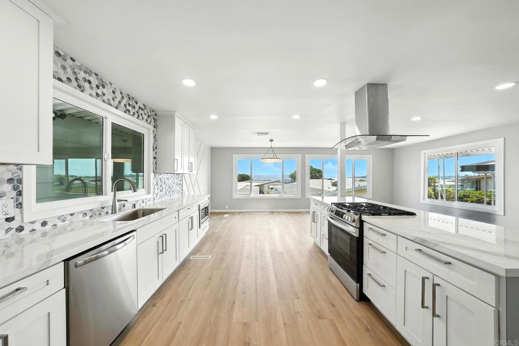 Discover the perfect retirement oasis in this beautifully remodeled 2 bed, 2 bath home located in a quiet senior community in Spring Valley. From the moment you walk in, you’ll be greeted by natural light, elegant finishes, and breathtaking views through large, energy-efficient windows. The brand-new kitchen features quartz countertops, stainless steel appliances (including refrigerator, dishwasher, and microwave), and a spacious island—perfect for cooking or entertaining. Enjoy the convenience of a private laundry room, central AC, LVP flooring, and modern updates throughout. The large primary suite feels like a retreat with dual vanities, an oversized walk-in shower with rain head and handheld sprayer, and ample closet space. Outside, enjoy 2-car tandem parking, a private storage shed, and plenty of guest parking nearby. This peaceful community offers great amenities including a pool, jacuzzi, and clubhouse. Space rent is $1,695/month and includes water, trash, sewer, and all exterior maintenance. No property taxes. Move-in ready and fully upgraded—this is the retirement lifestyle you’ve been waiting for!